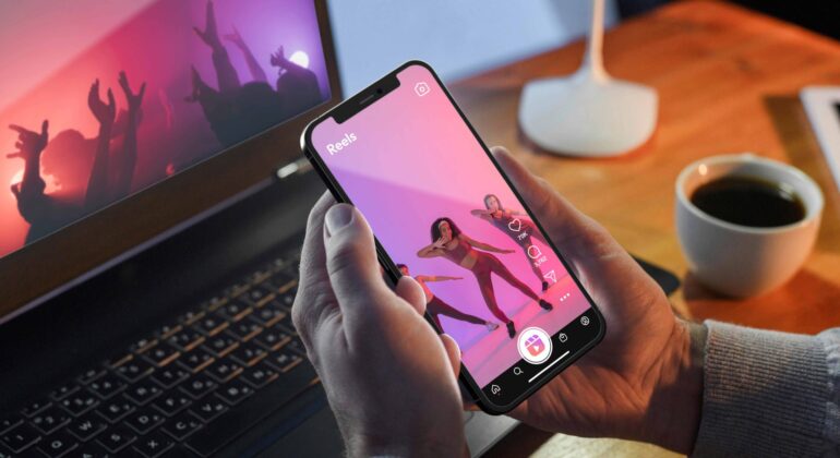 high-angle-hands-holding-smartphone 2